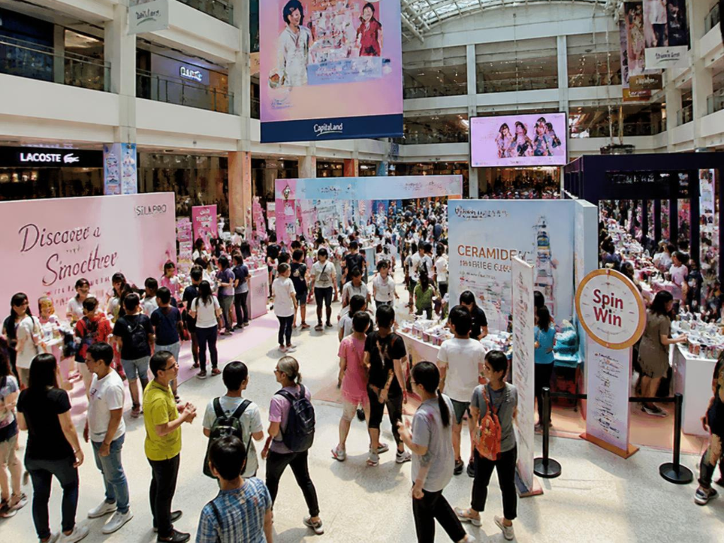 What atrium rules do Singapore malls enforce for roadshow setups?